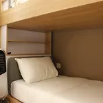 Classic And Comfy 2Br @ Gateway Pasteur Apartment By Travelio