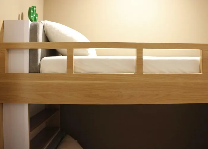 Classic And Comfy 2Br @ Gateway Pasteur Apartment By Travelio